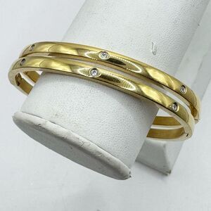 2 Gold Tone Bangle Bracelets With Rhinestone Details Stainless Steel Hinged